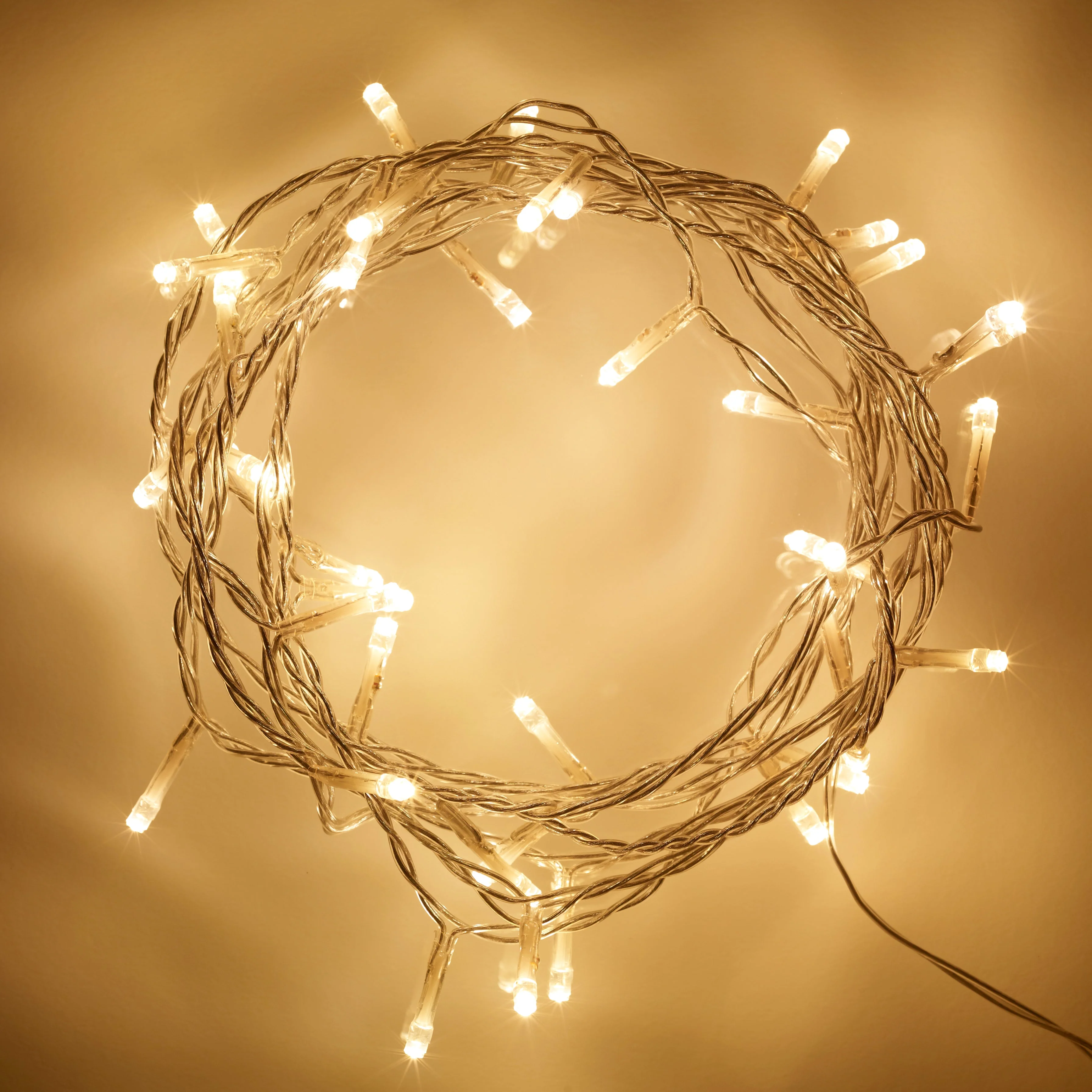 50 Warm White LED Indoor Fairy Lights On Clear Cable with Remote - Image 3