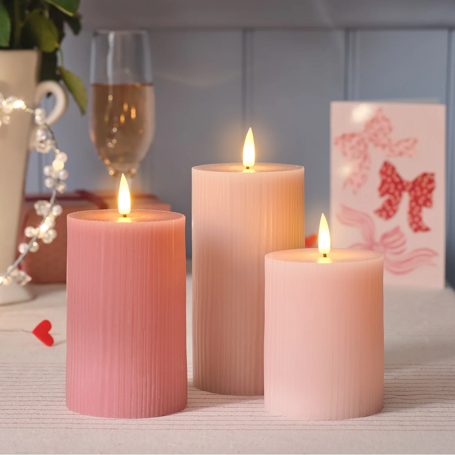 TruGlow® Blush Pink Ribbed LED Pillar Candle Trio - Image 2